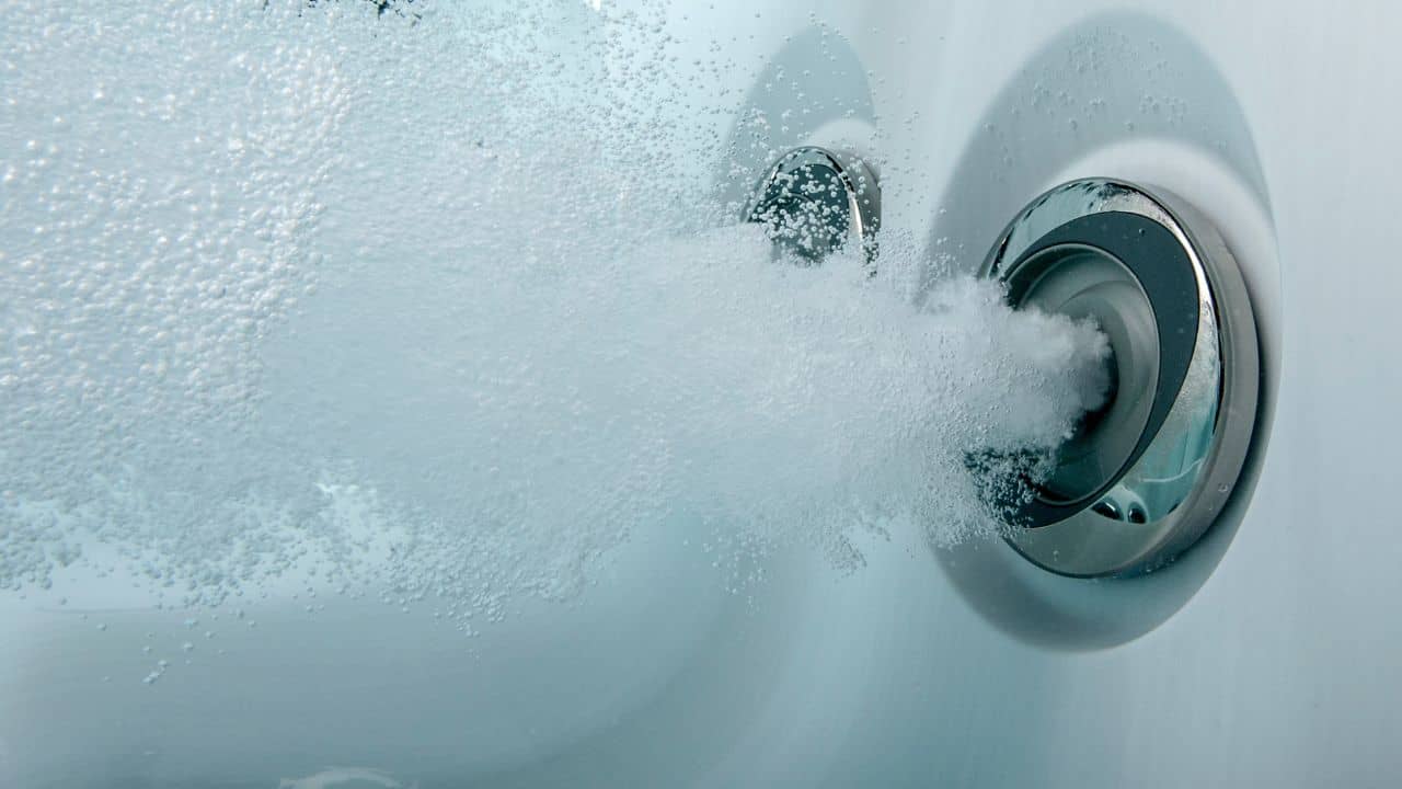 how often is it necessary to drain a hot tub